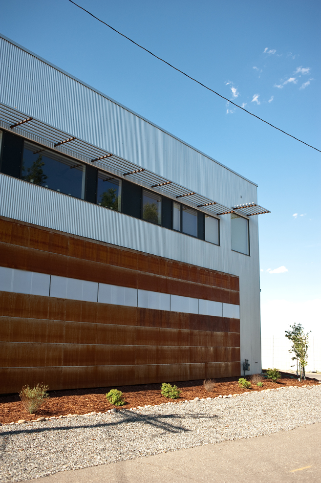 Exterior view of the Vonmod building with corrugated metal and corten steel facade in Denver