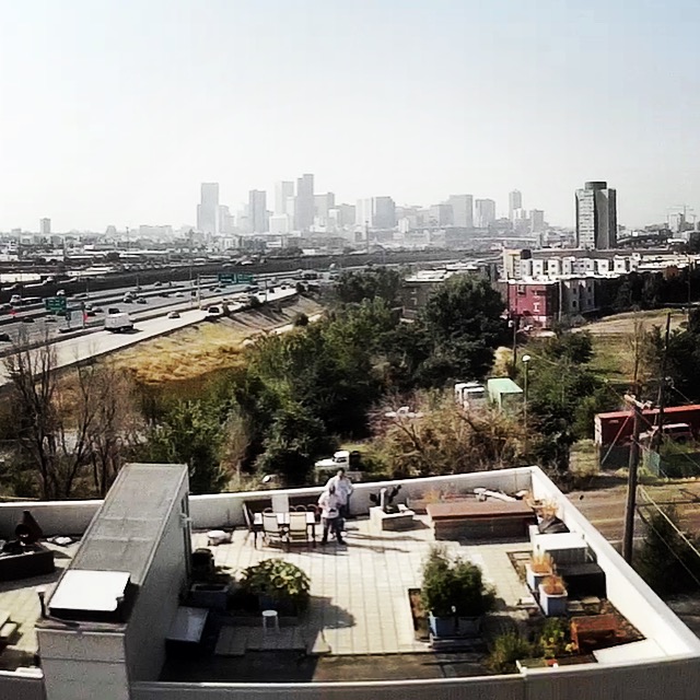 Rooftop terrace atop the Vonmod building overlooking the Denver skyline